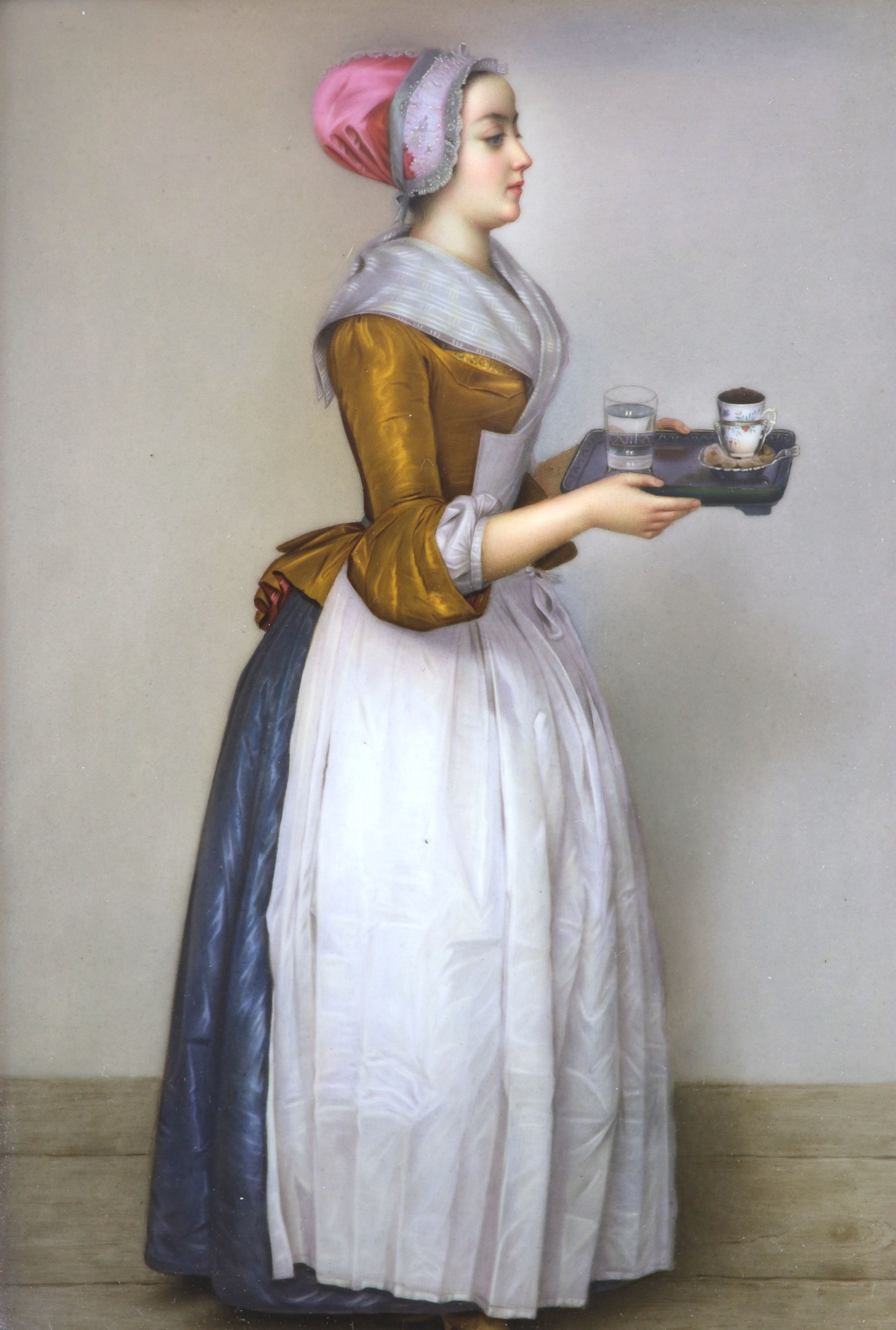 A KPM Berlin porcelain plaque painted with ‘The Chocolatier’ after Jean-Etienne Liotard, late 19th century, Porcelain 23.2cm x 15.8cm, in a gilt frame